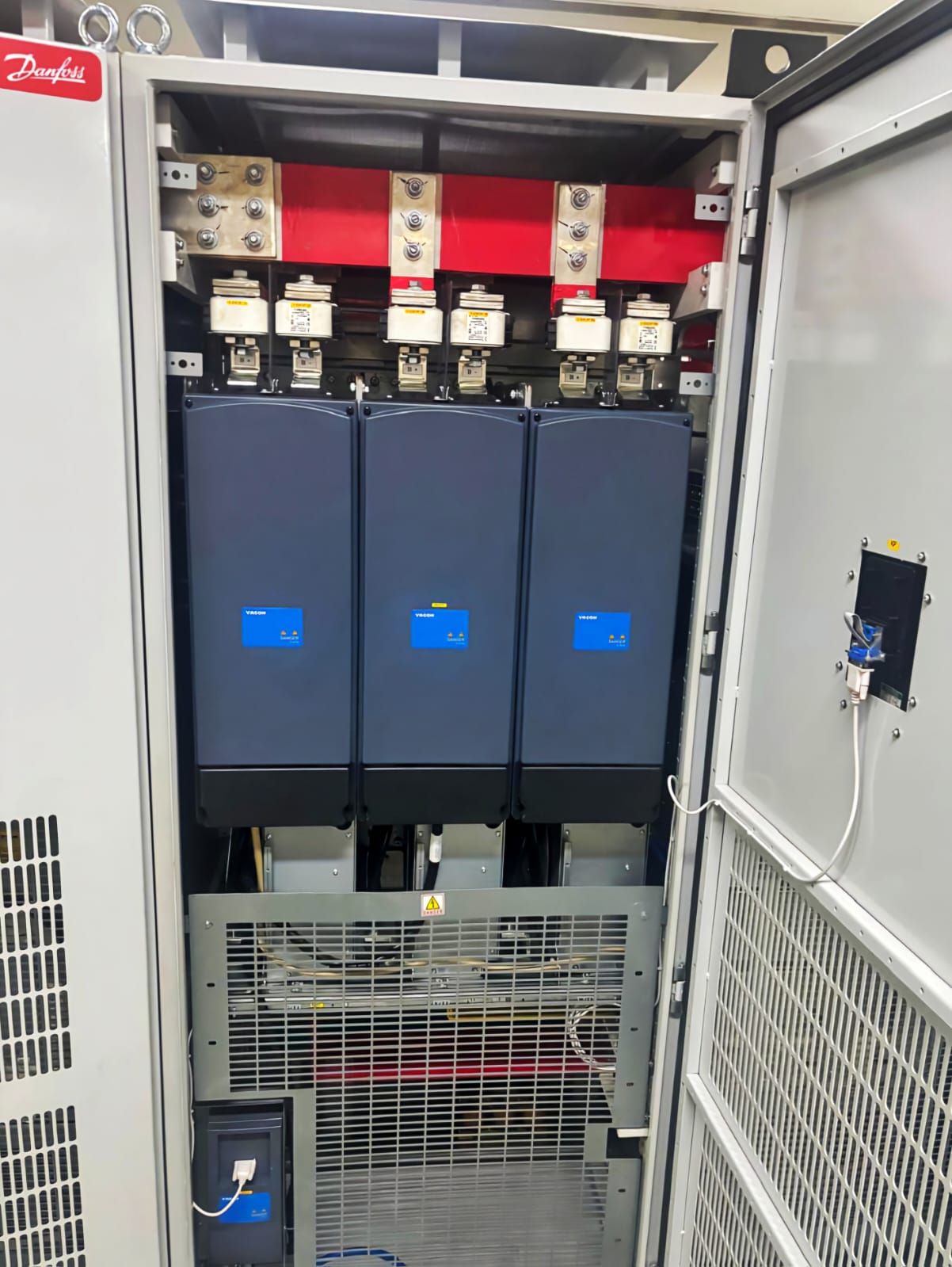 Genuine Danfoss VACON drives installed inside a manufactured panel