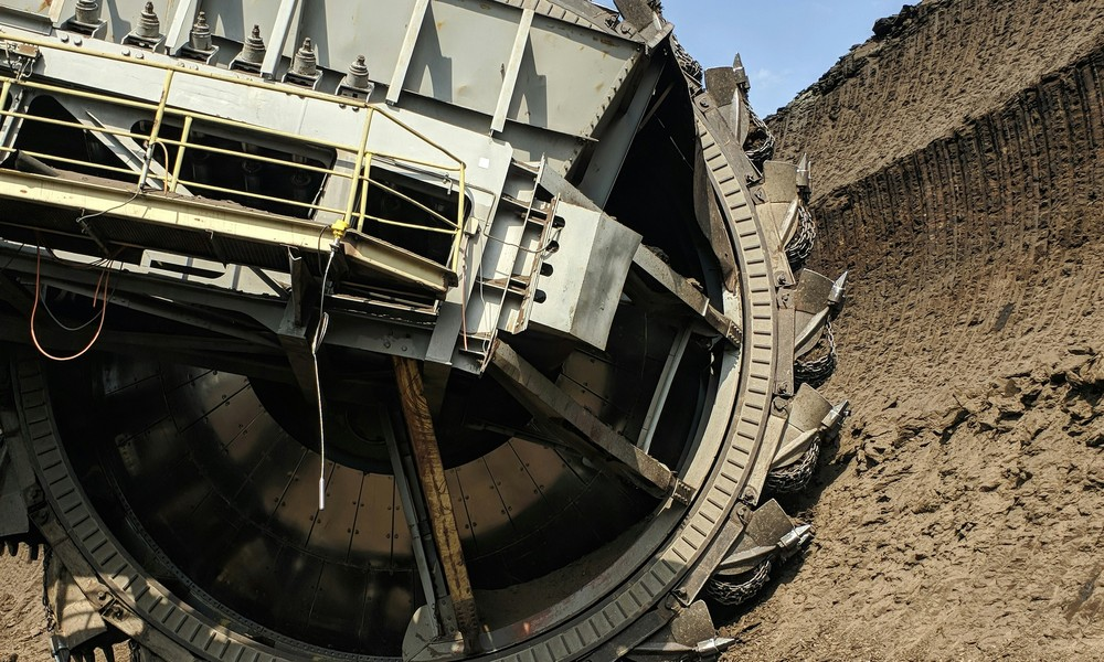 Close-up of a rotating mining excavator wheel